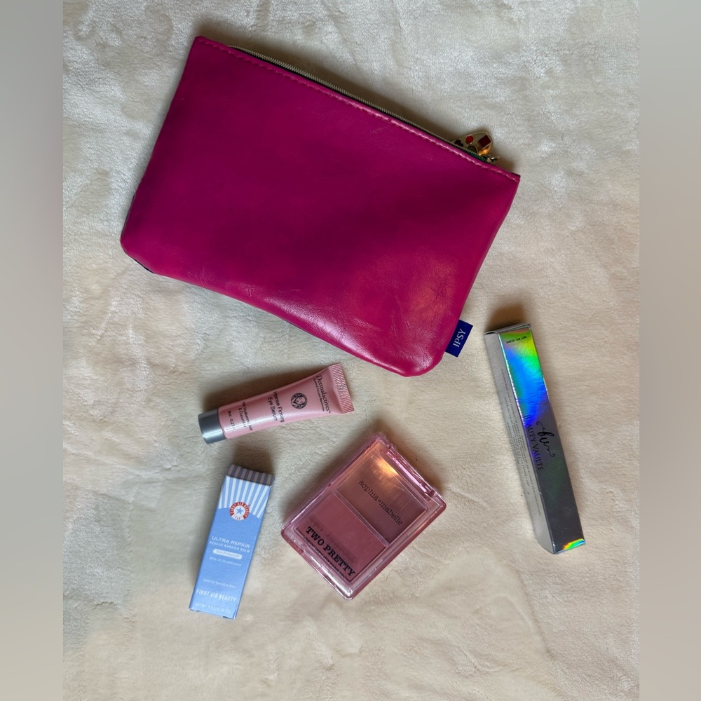 Pink Cosmetic Pouch with Beauty Products